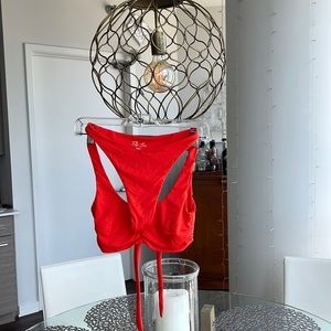 Riot Swim orange bikini. NWOT. Never worn. Bottoms are a small and top is XS